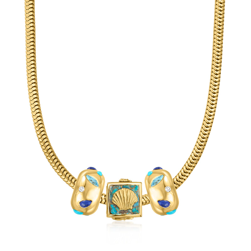 Gold-tone sea life charm set on a chain necklace with turquoise blue shell and dolphins