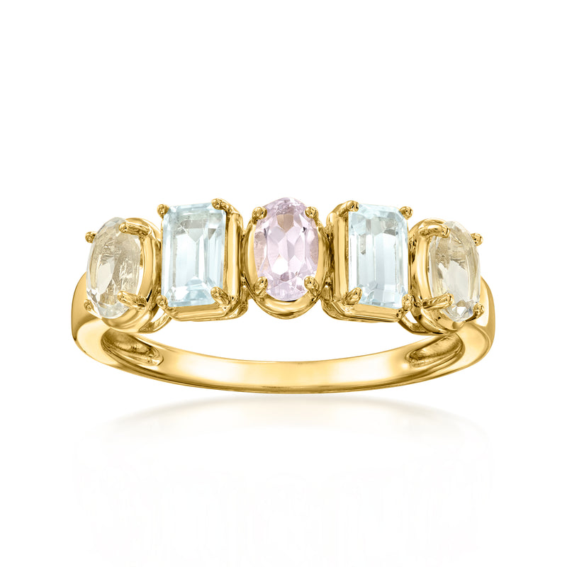 Gold-tone ring with pastel rectangular gemstones in ornate prong setting