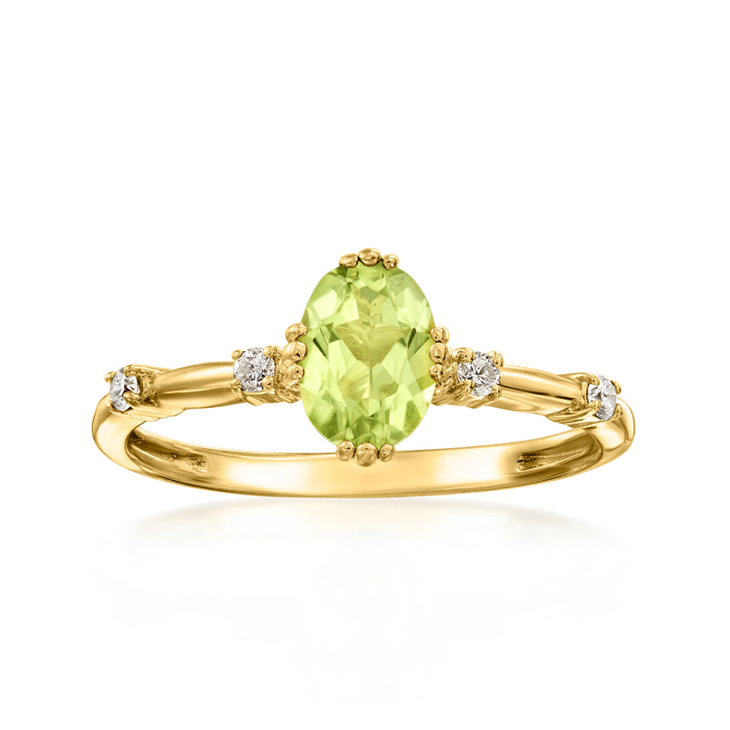 18kt gold over sterling ring with oval peridot center and diamond side accents