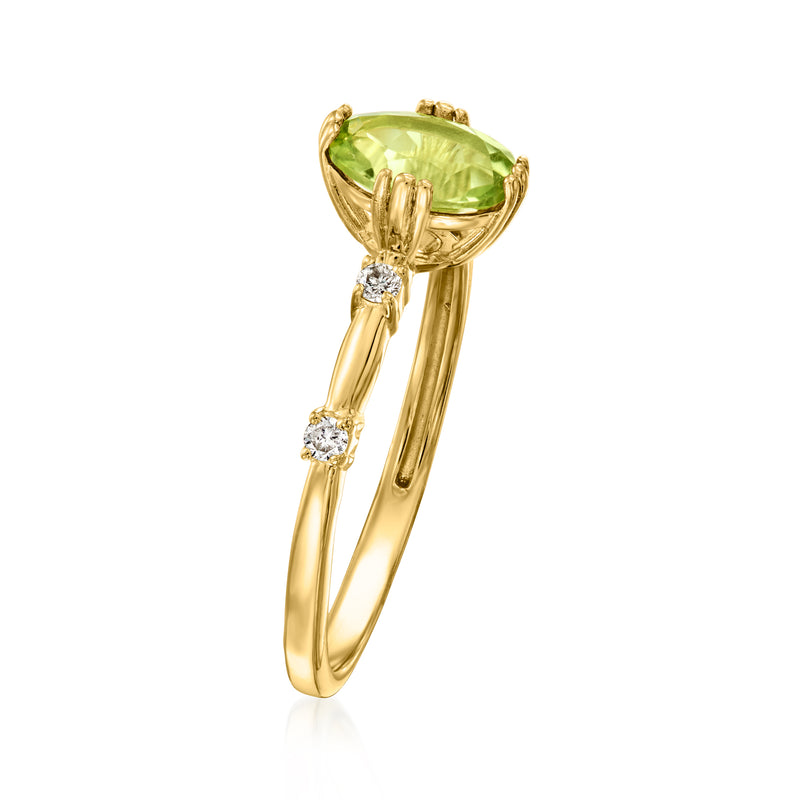 Gold-toned ring with prong-set oval peridot and two round diamond accents