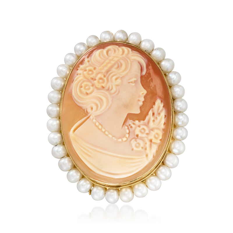 Oval yellow gold cameo pendant with brown shell portrait and white pearl border.