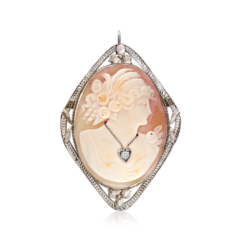 Brown shell cameo pendant with diamond-set frame and prong border, 14kt white gold