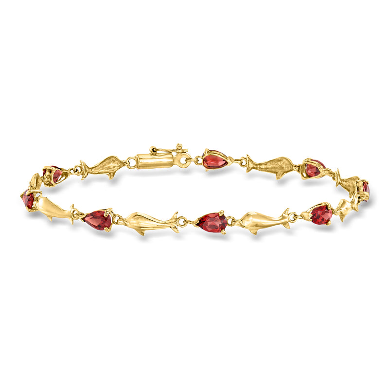 10kt yellow gold dolphin link bracelet with red oval garnet stones
