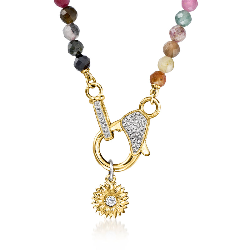 Gold lobster clasp necklace with multicolored tourmaline beads and dangling sunburst charm