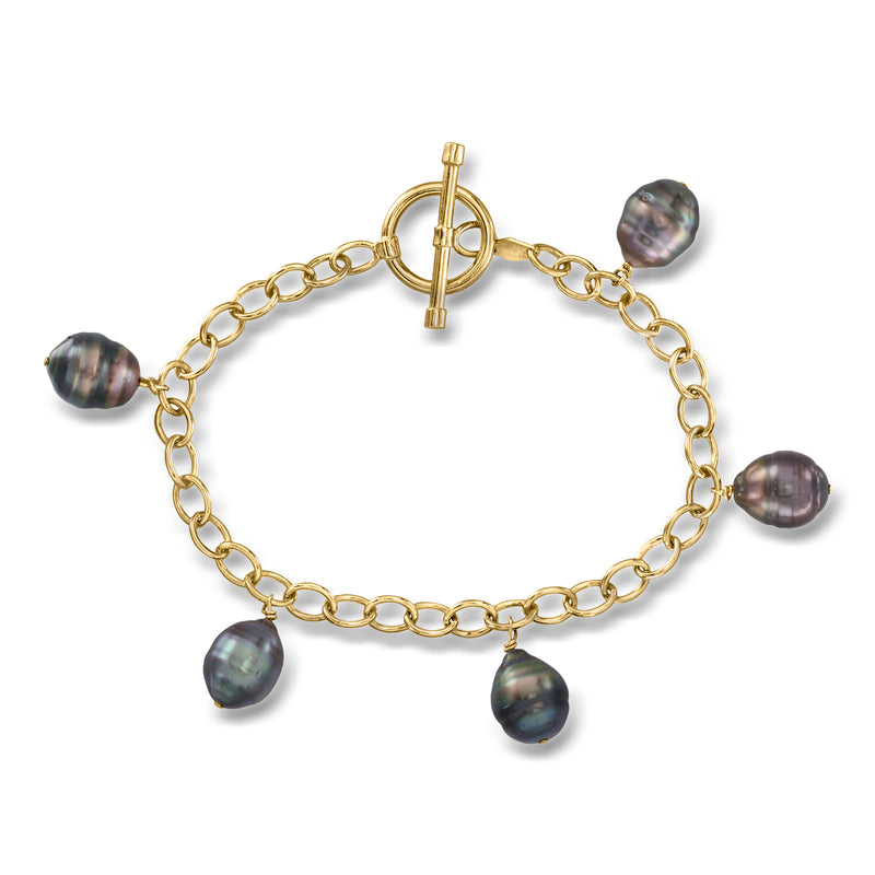 14kt yellow gold charm bracelet with toggle clasp and dark semi-baroque pearl charms