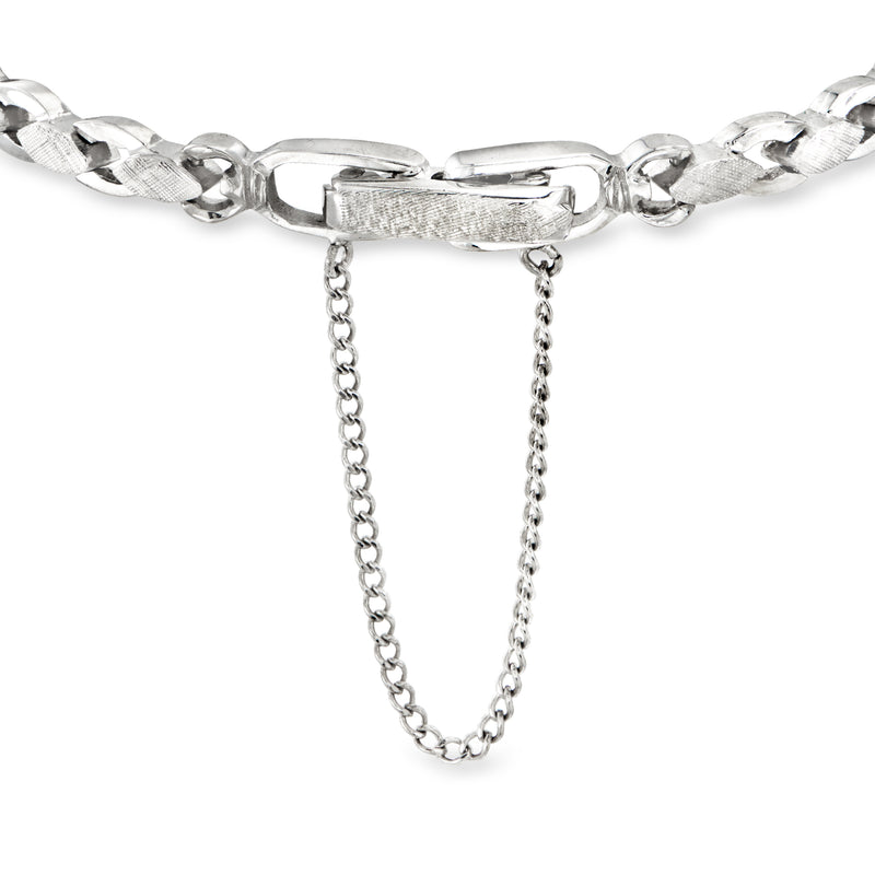 White gold bracelet close-up of hinge clasp with long silver chain drop details