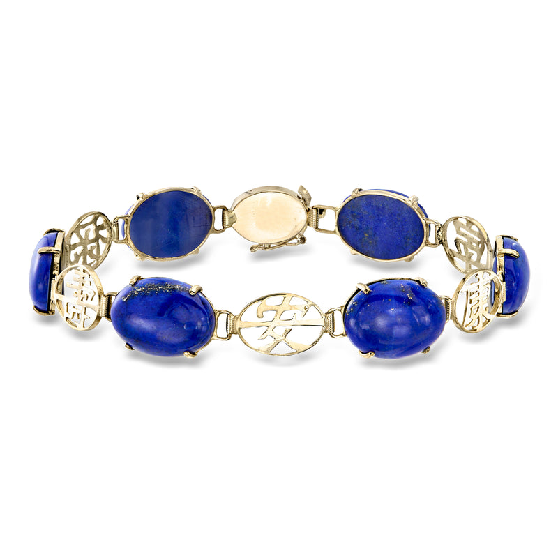14kt yellow gold bracelet with blue lapis oval cabochons and light center medallion