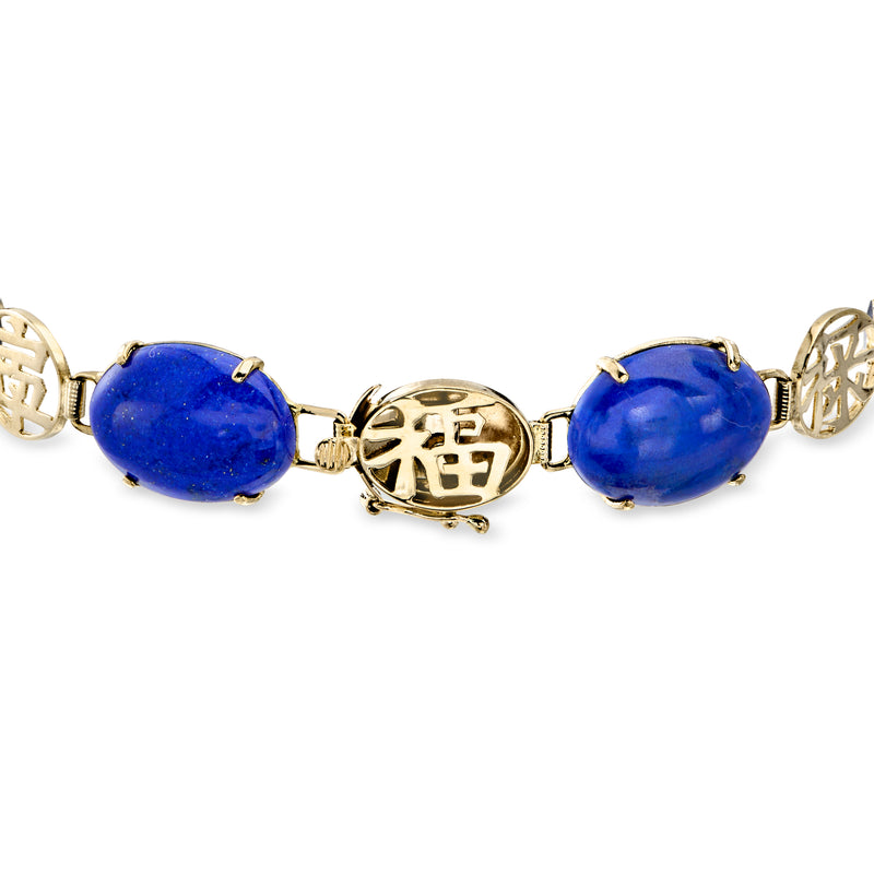 Lapis oval cabochon 14kt yellow gold bracelet with engraved centerpiece and link chain