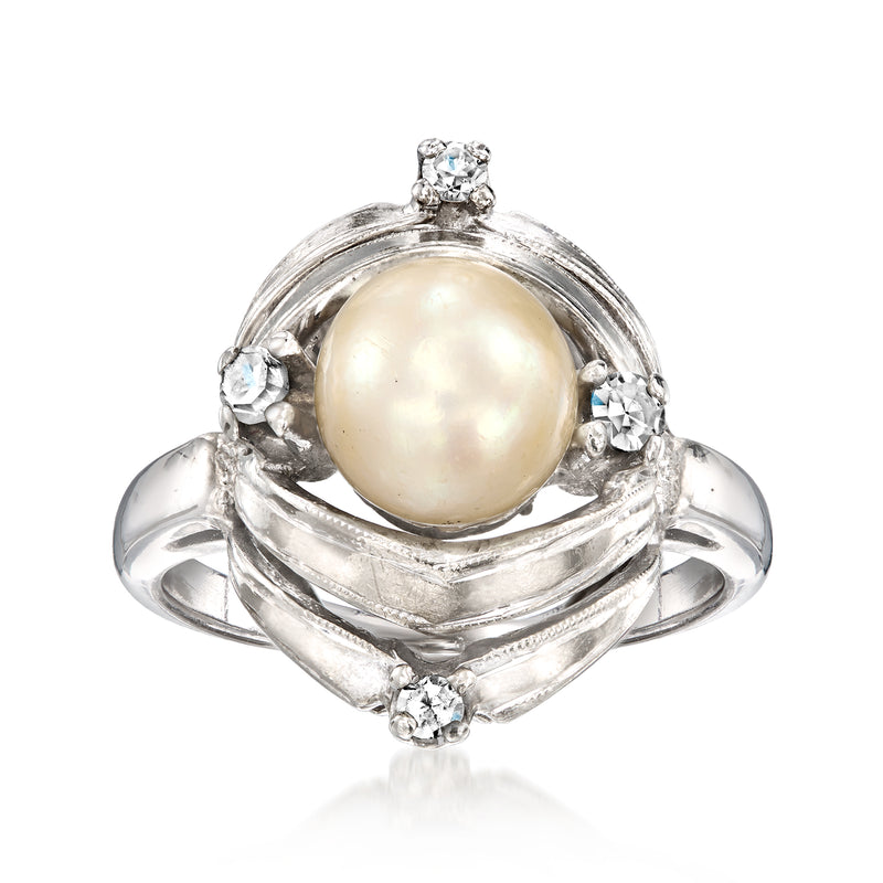 Cultured pearl and diamond ring in white gold, round pearl with prong-set accents
