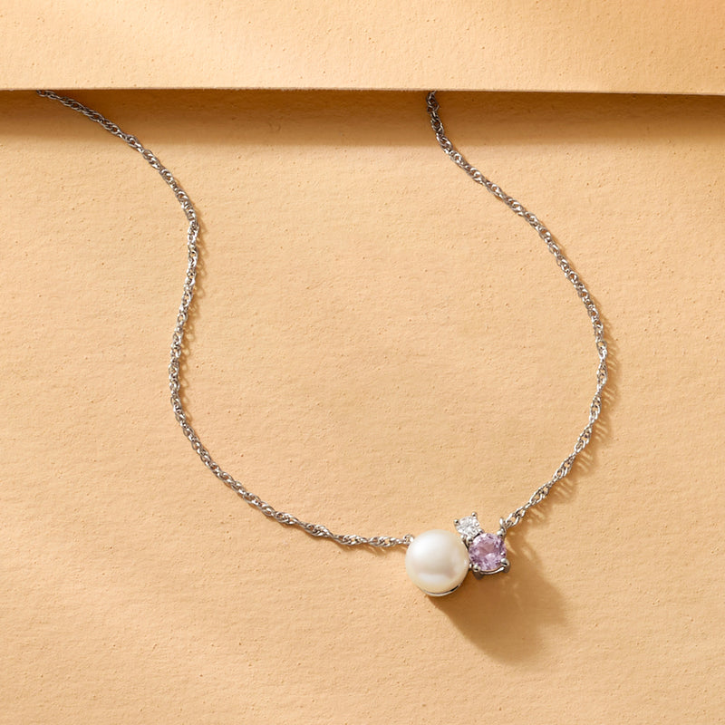 Sterling silver chain necklace with pearl, purple amethyst charm, and clear diamond