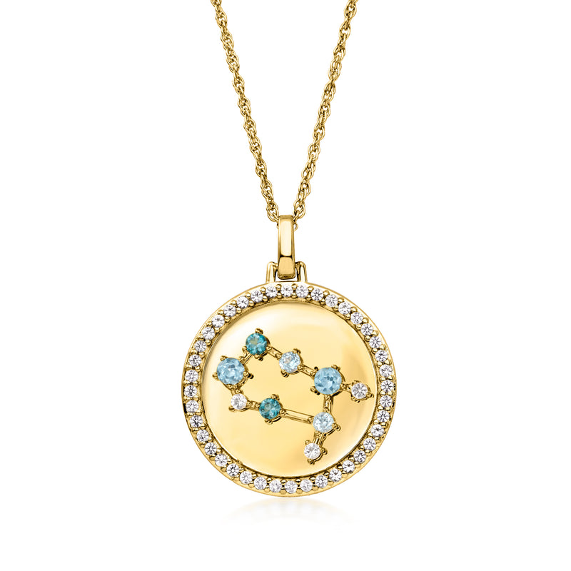 Gold tone zodiac constellation pendant necklace with blue constellation stones and clear halo