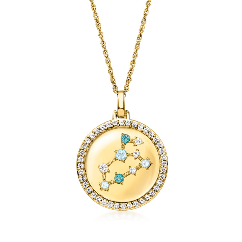 Gold tone zodiac constellation pendant necklace with blue stones and sparkling clear border