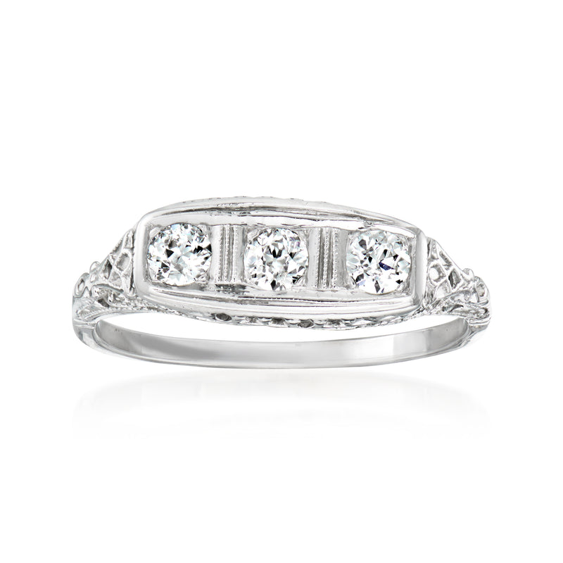Three-stone diamond ring in white gold with three rectangular settings
