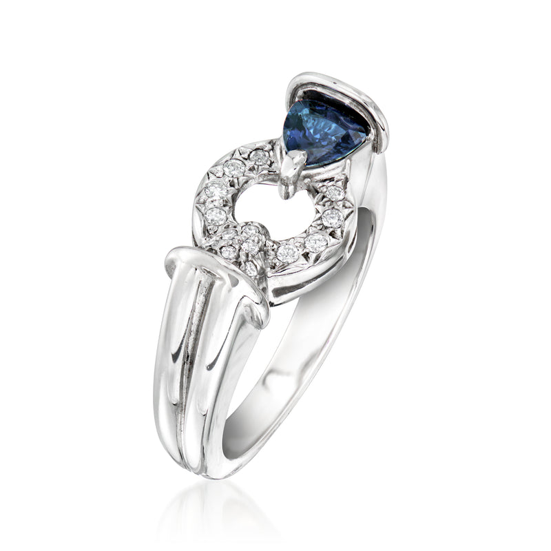 Platinum sapphire and diamond circle ring with blue oval stone in prong setting