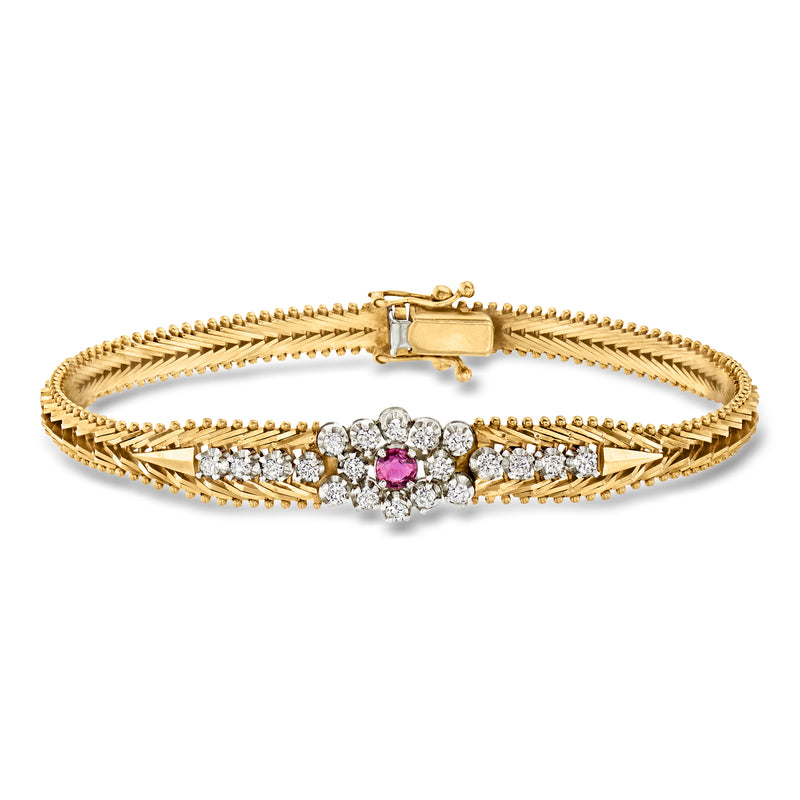 Vintage gold diamond and ruby bracelet with oval center cluster and hinged clasp