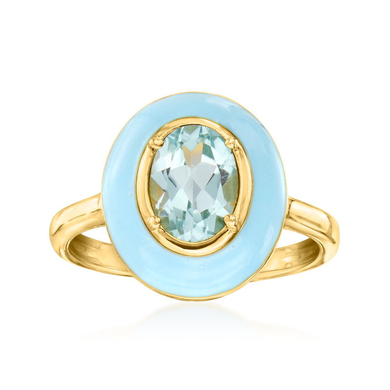 Gold ring with sky-blue gemstone in oval blue enamel bezel, gold prongs.