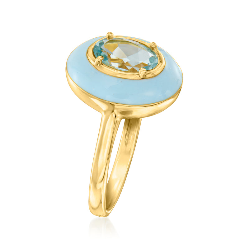Gold ring with oval blue enamel top and sky-blue gemstone centerpiece.
