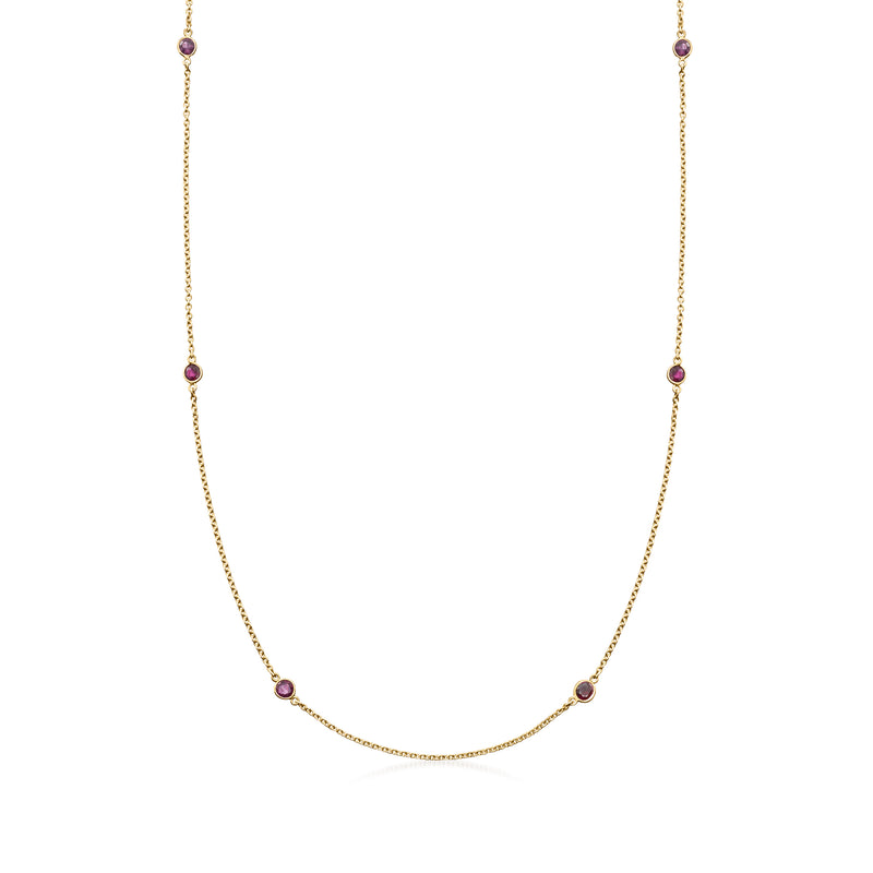 14kt yellow gold station necklace with round ruby gemstones and small accents