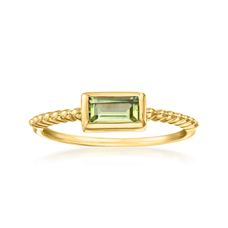 Gold-tone ring with rectangular green gemstone and twisted split-shank