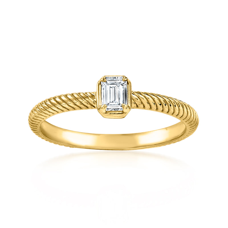 Twisted gold ring with a rectangular emerald-cut diamond center setting