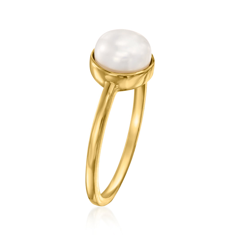Gold over sterling ring featuring a round white pearl bezel setting