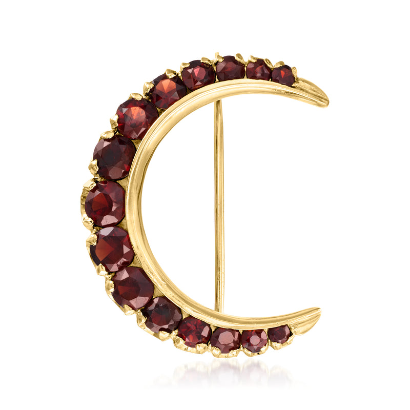 Crescent moon pin in 18kt yellow gold with dark red garnet gemstone border