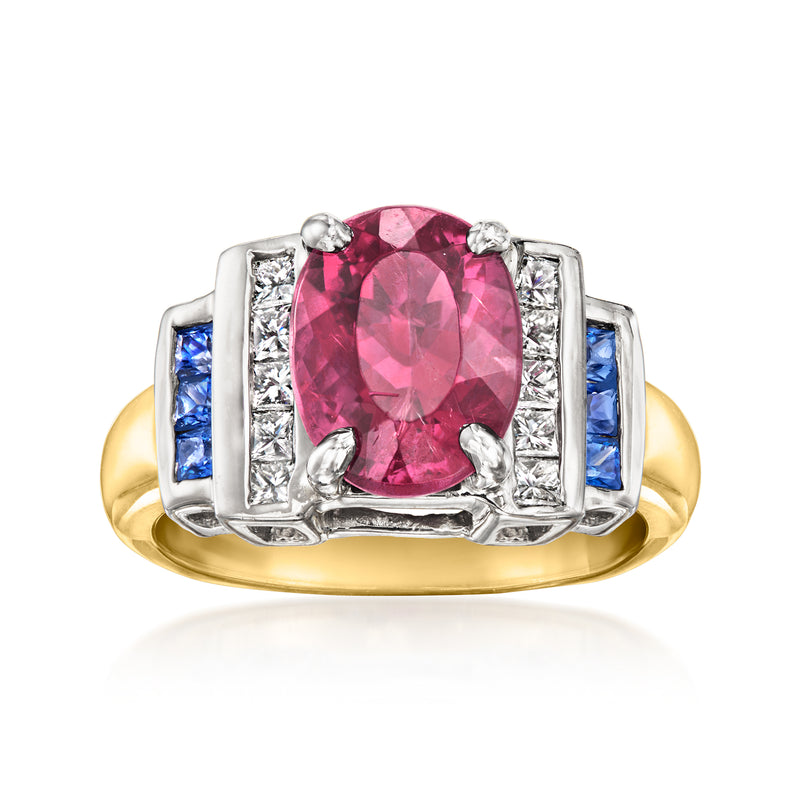 Vintage pink oval tourmaline ring with diamond accents and blue sapphire side stones