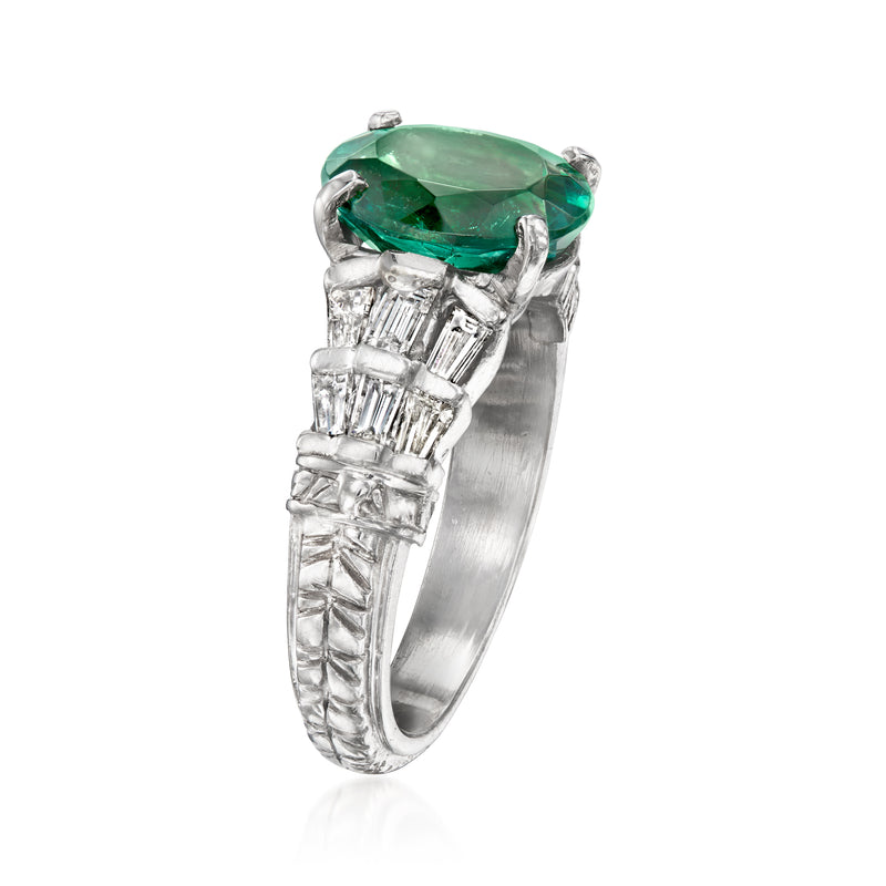 Platinum ring side view with oval green tourmaline and baguette diamond setting