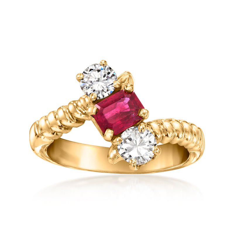 14kt yellow gold bypass ring with oval ruby center and diamond accents