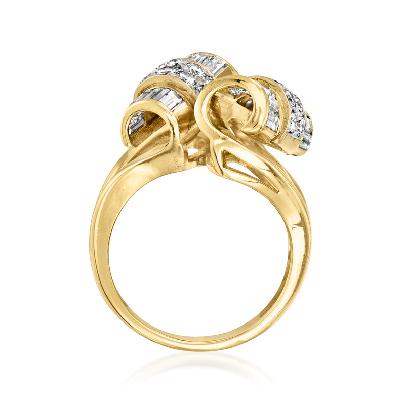14kt yellow gold diamond scroll ring viewed from side, openwork with baguette stones