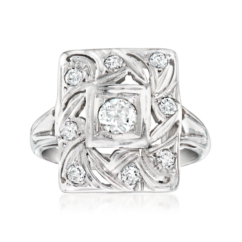 Square-cut diamond cluster ring in 14kt white gold with sculpted openwork band
