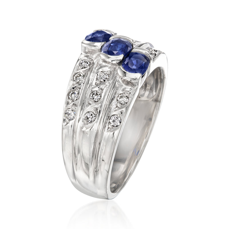 Platinum vintage ring with three blue sapphires and diamond accents