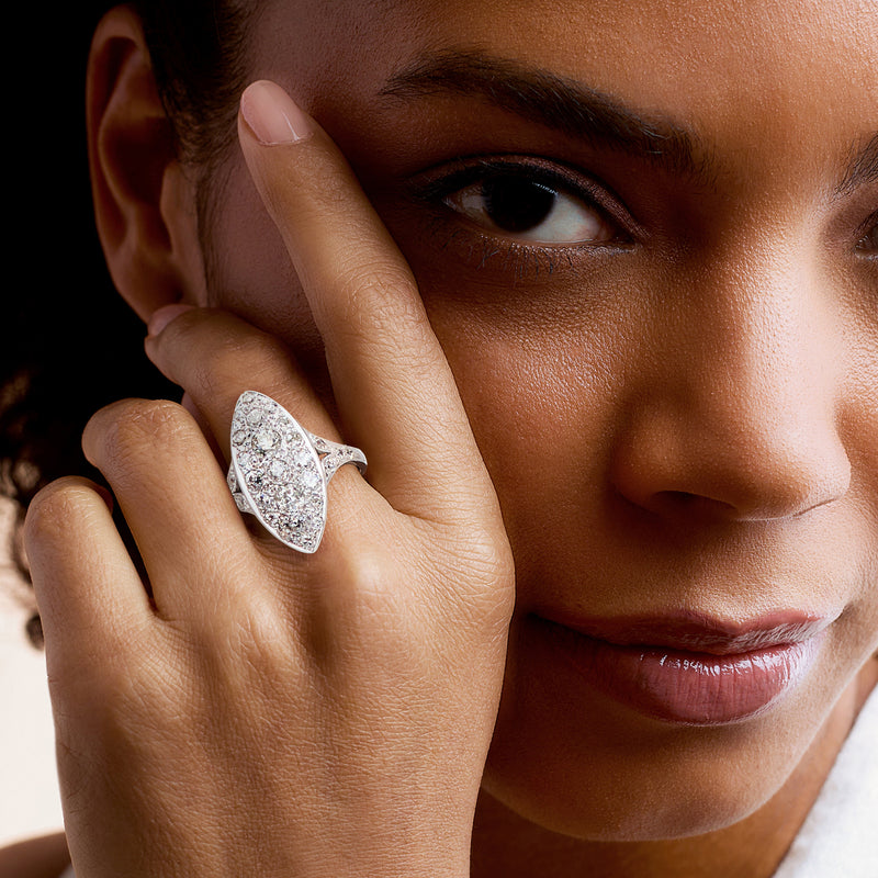 Marquise-shaped diamond ring in 14kt white gold on a hand