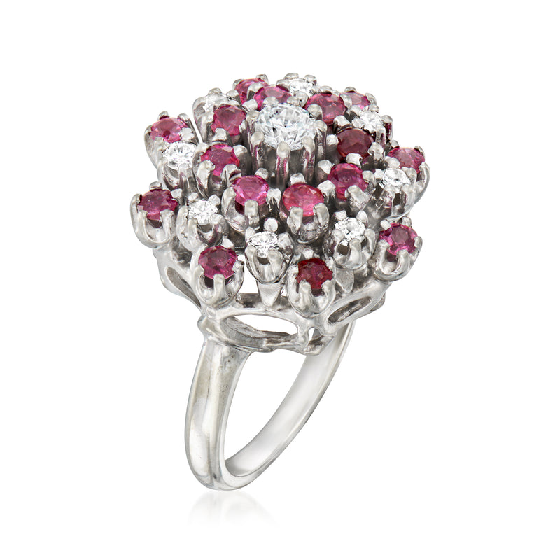 White gold cluster ring with pink ruby stones and sparkling white diamond accents