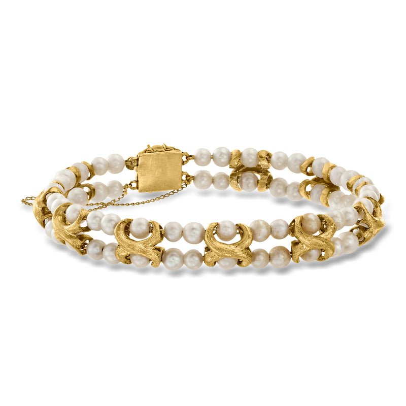 Two-row cultured pearl bracelet with 14kt yellow gold links and clasp