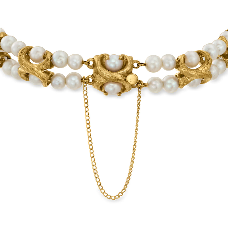 Cultured pearl bracelet with gold toggle clasp and double-row pearl strands