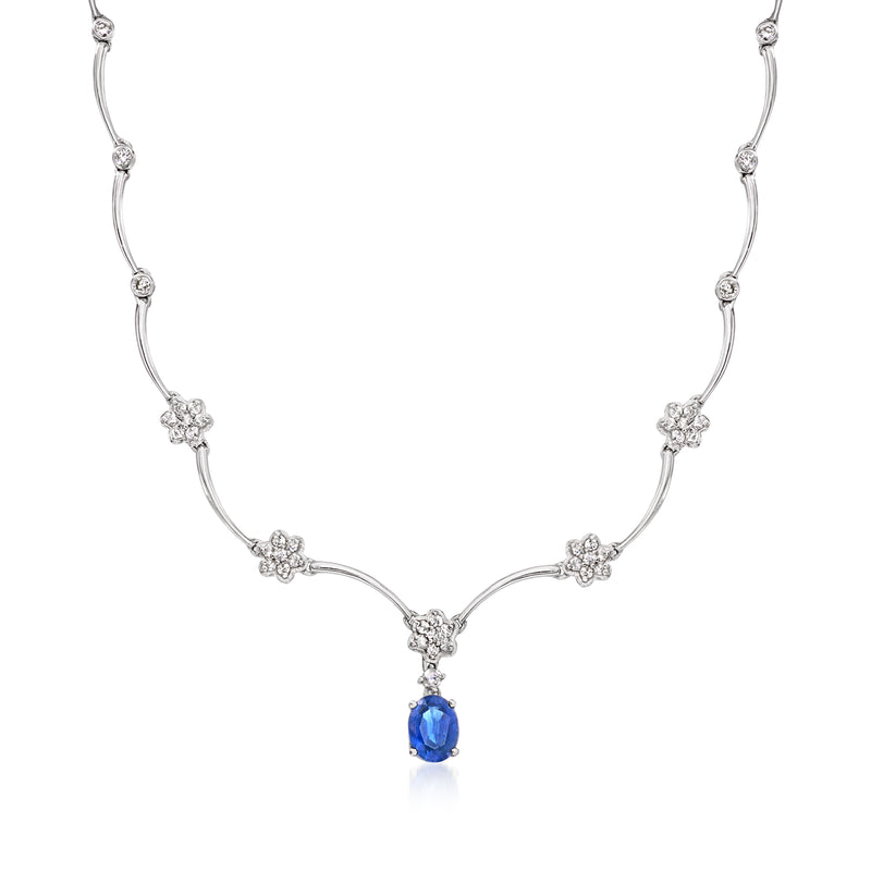 18kt white gold scalloped necklace with blue sapphire drop and diamond clusters