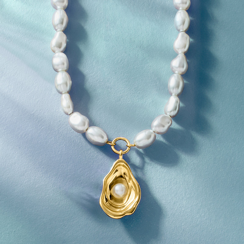 White baroque pearl necklace with gold seashell drop pendant and round clasp links