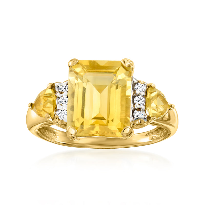 Yellow gold ring with large rectangular citrine center and diamond side accents