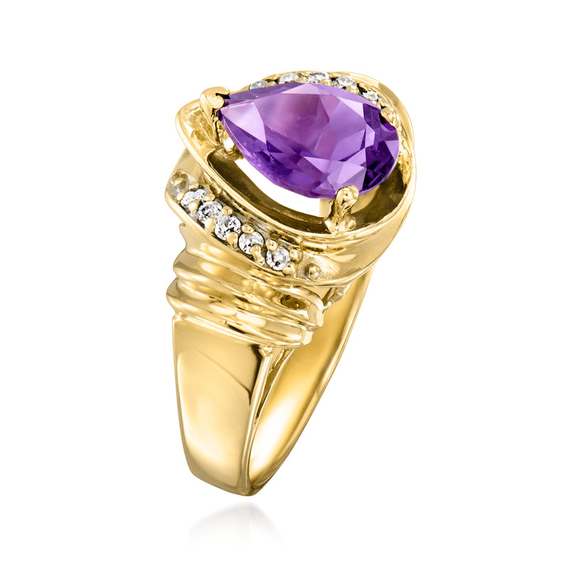 Yellow gold ring with large faceted purple amethyst set in prongs and diamond accents