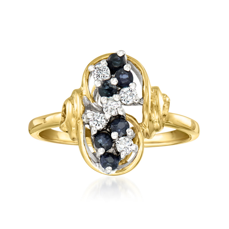 14kt yellow gold cluster ring with dark sapphire and round diamond accents