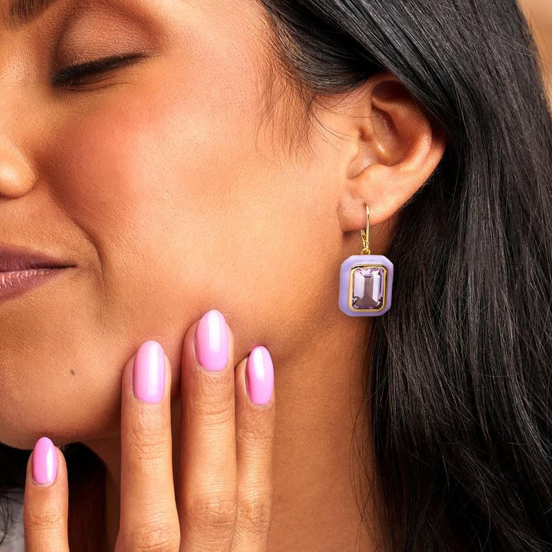 Leverback drop earrings with square amethyst stones in pastel purple enamel, on model