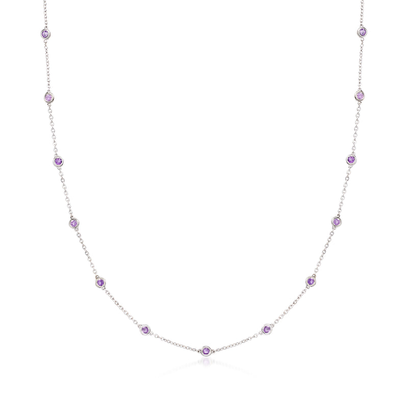 Amethyst station necklace with small purple gemstone stations on fine white gold chain