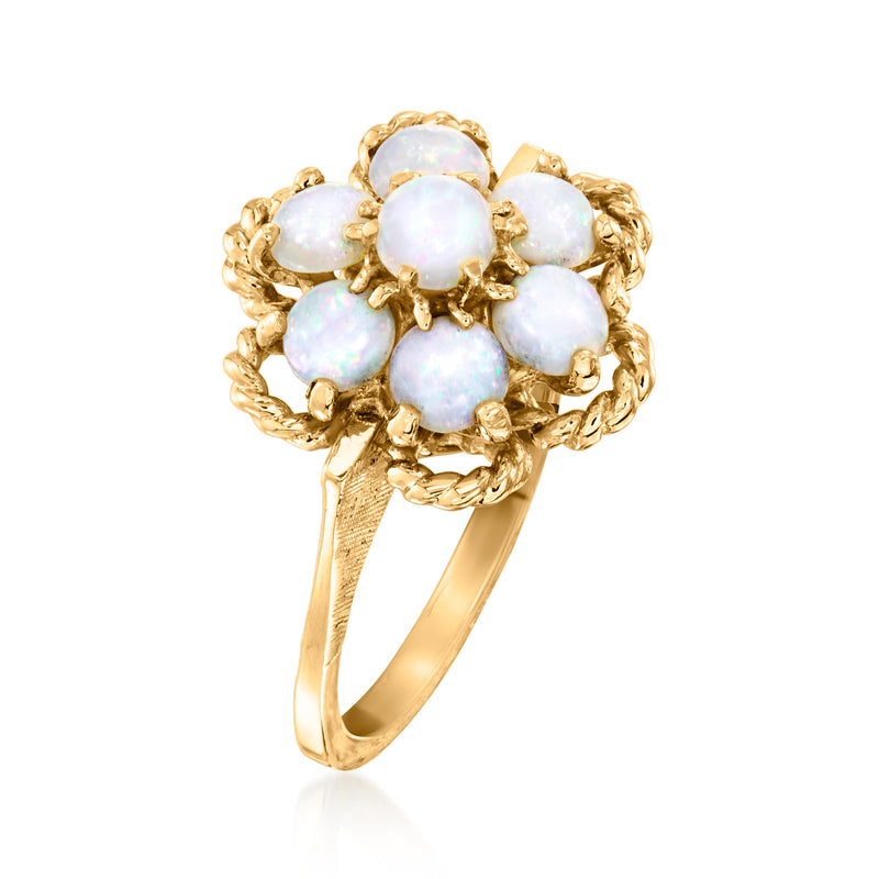 14kt yellow gold opal flower cluster ring, side view with raised gold frame