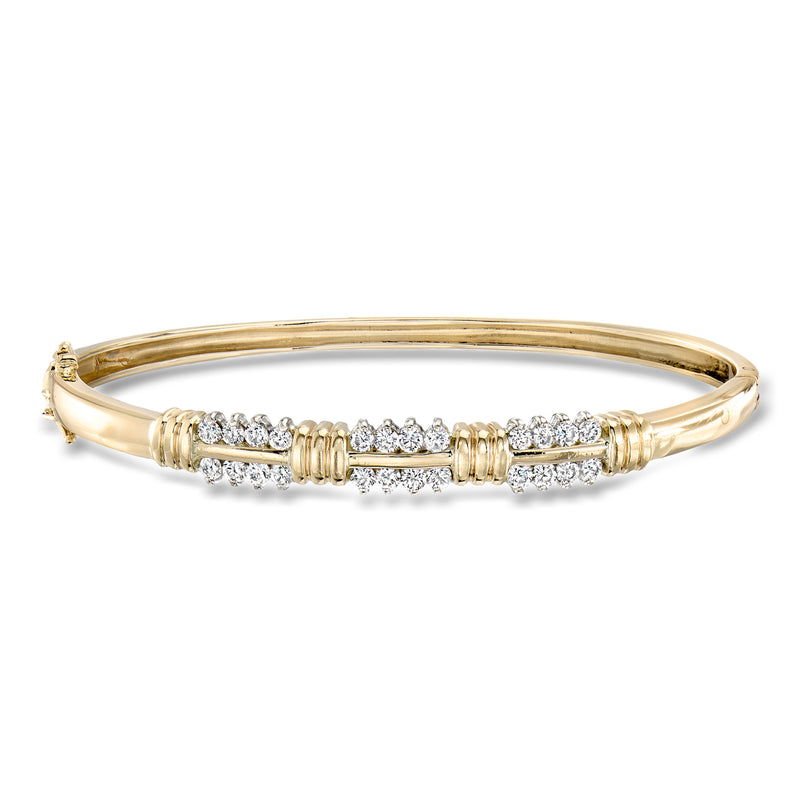 Two-tone 14kt gold diamond bangle bracelet with prong-set row of small diamonds