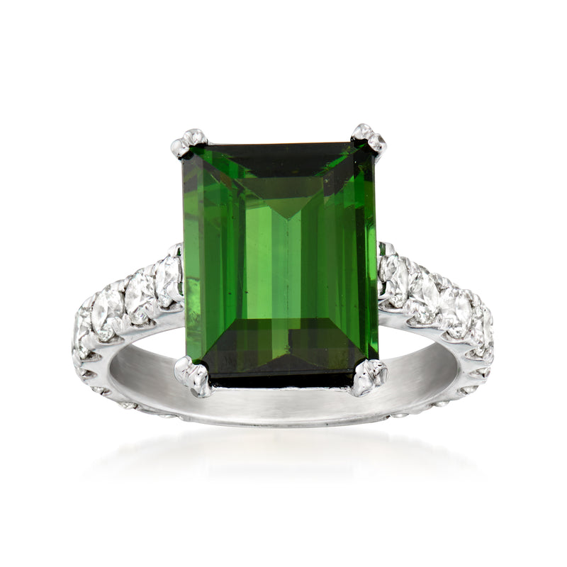 Green tourmaline solitaire ring with diamond halo, set in white gold