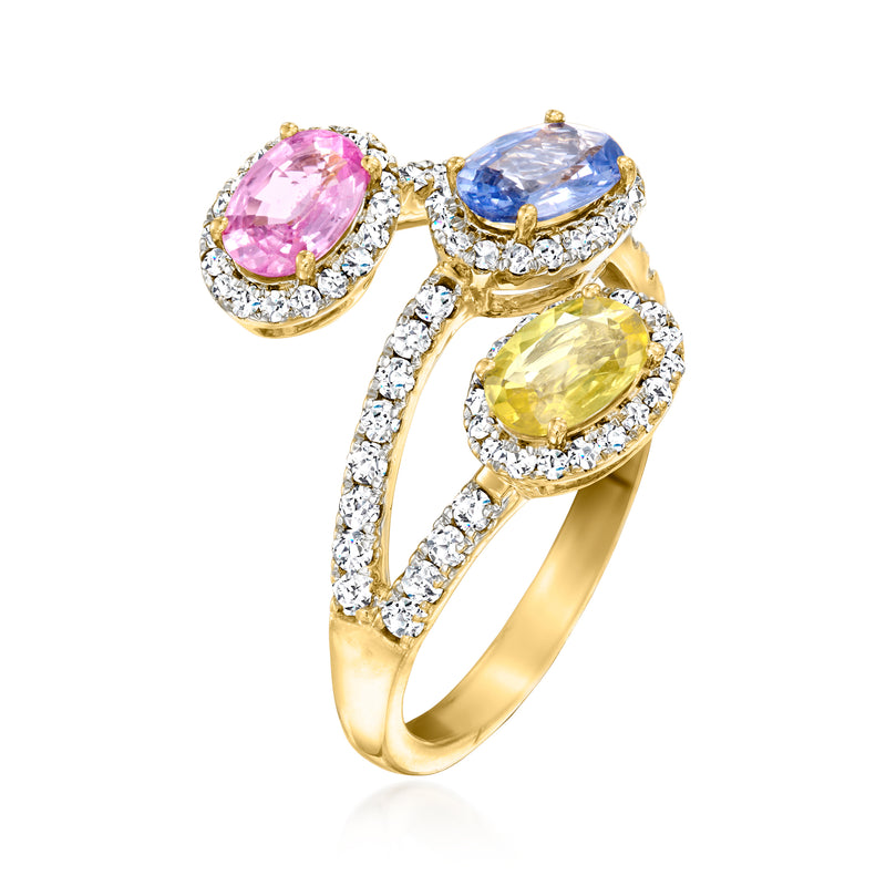 14kt yellow gold bypass ring with pink, blue, and yellow sapphire halos of diamonds