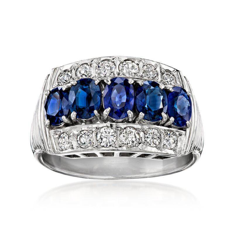 Platinum vintage sapphire and diamond ring with three blue oval gemstones