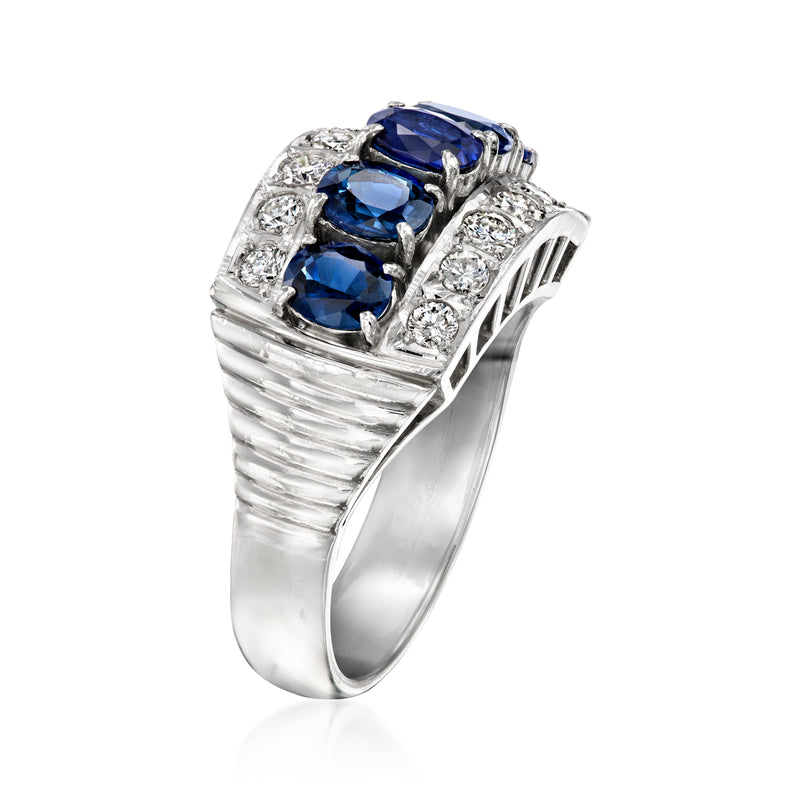 Platinum sapphire and diamond cluster ring with three blue oval stones