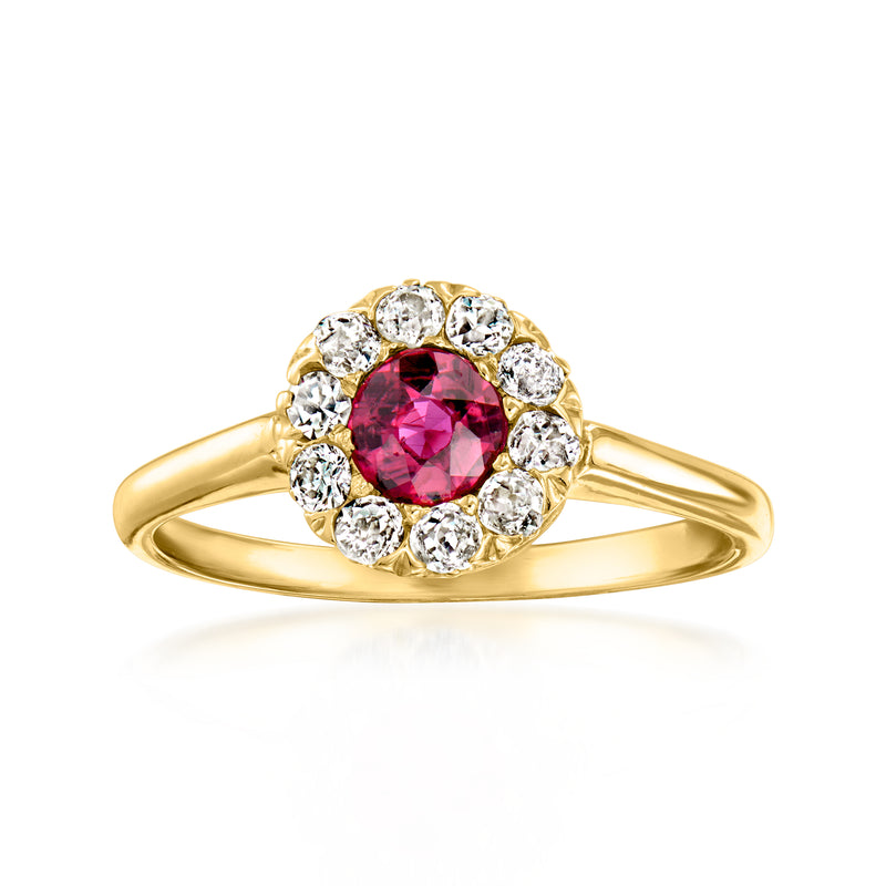 Vintage ruby and diamond halo ring in 14kt yellow gold, round pink center stone